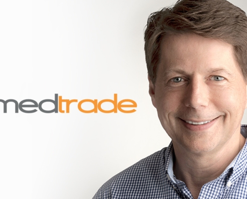 Picture of Seed's Ralph Solarski next to the Medtrade logo