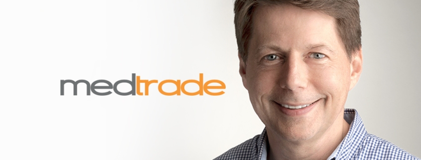 Picture of Seed's Ralph Solarski next to the Medtrade logo