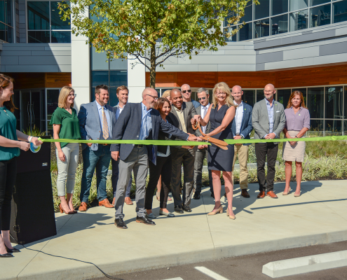 Picture of the ribbon-cutting ceremony for Seed Strategy's new headquarters