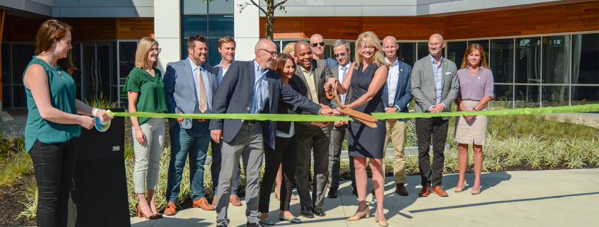 Picture of the ribbon-cutting ceremony for Seed Strategy's new headquarters