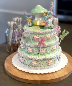 The product of Troy's creativity—a beautiful princess-themed, buttercream-frosted birthday cake